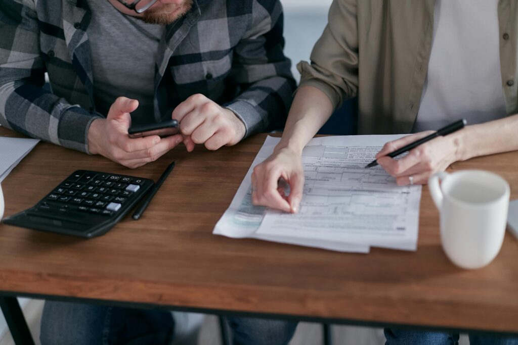 A couple filing out taxes.