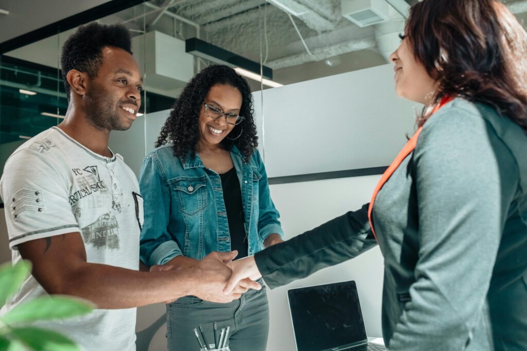 Couple speaking to a financial advisor.